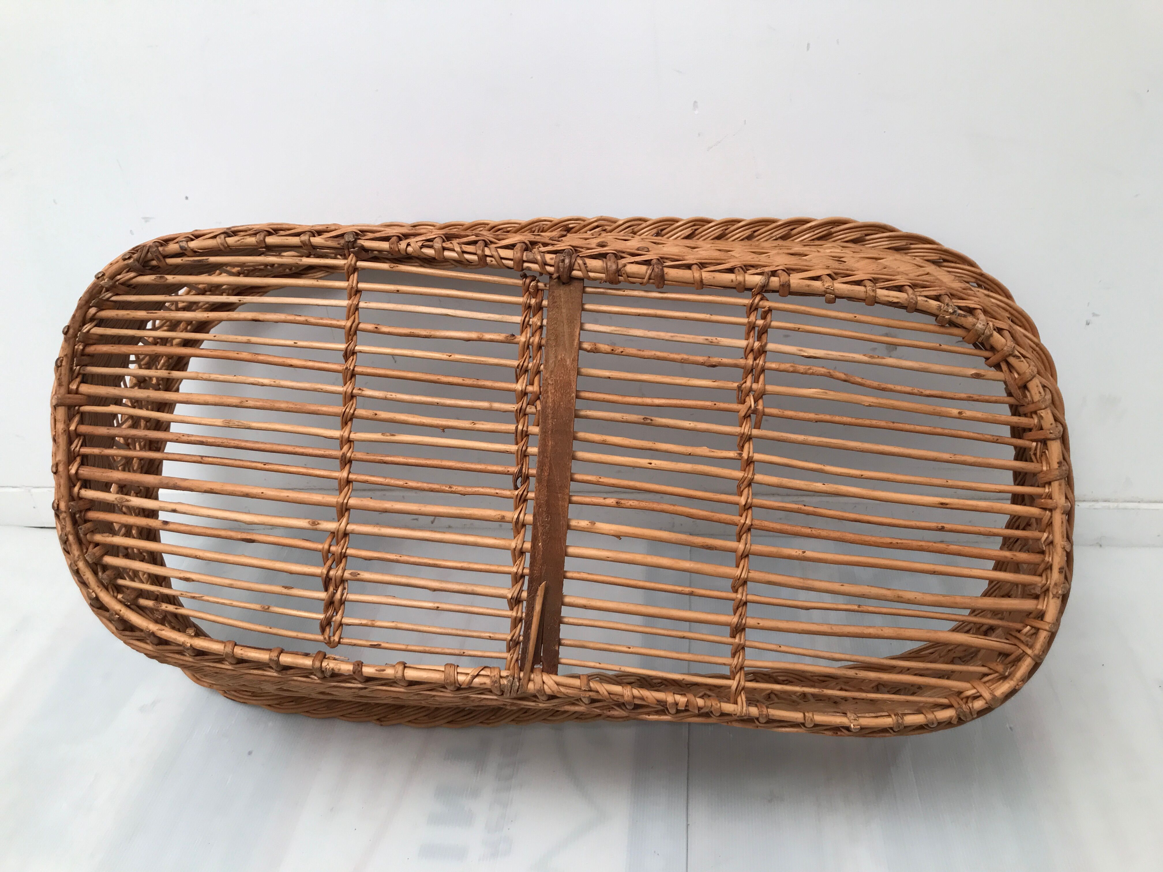 Vintage wicker cradle with 50-60s wheels