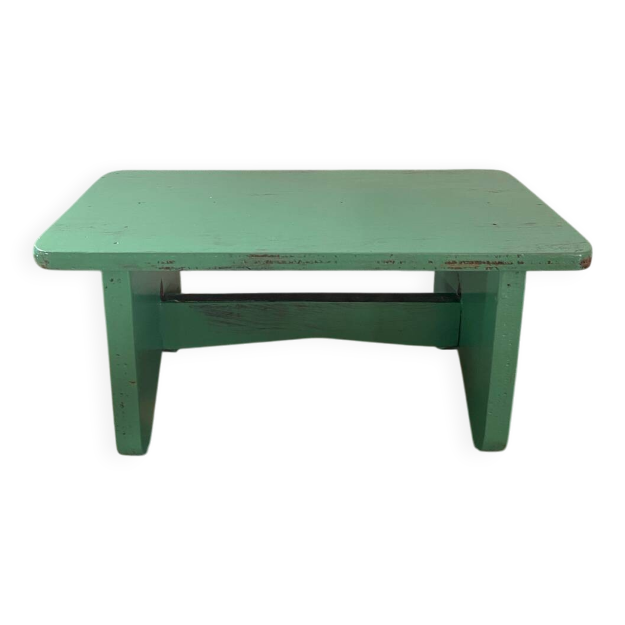 Vintage wooden footrest in mint green.