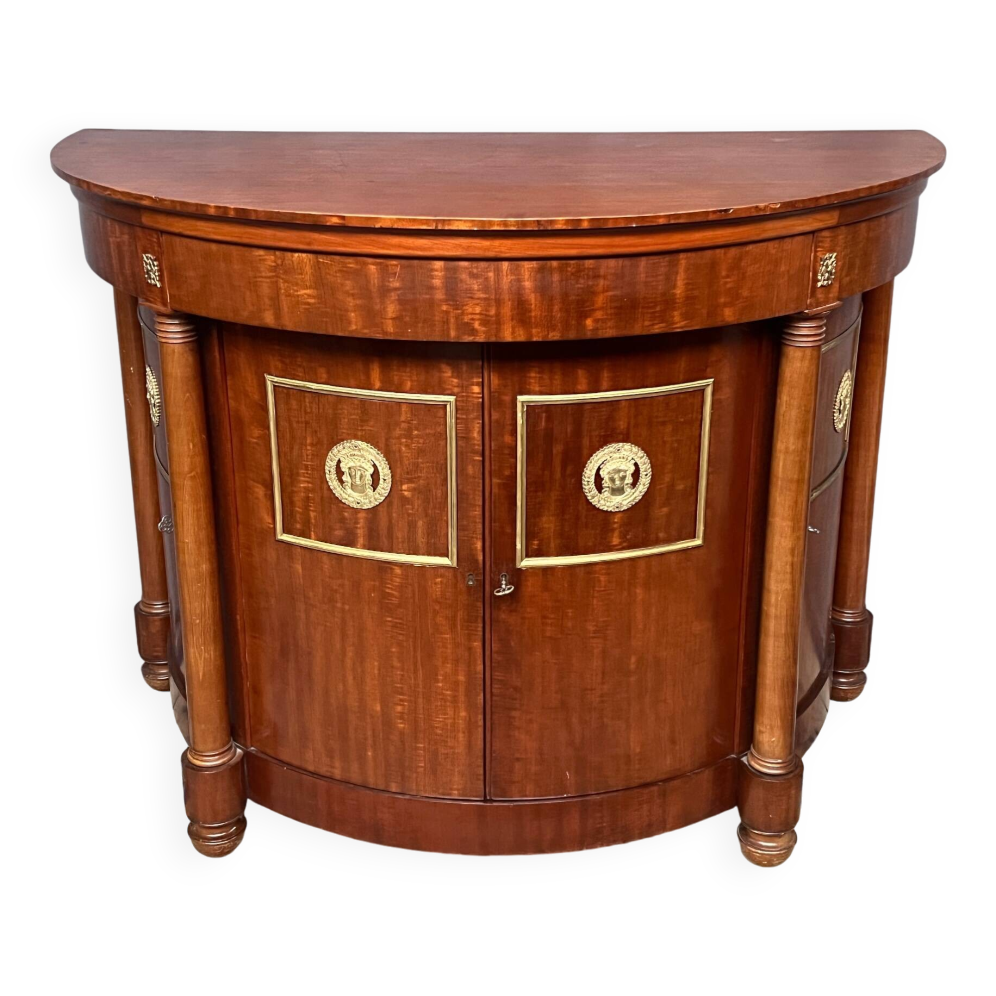 Empire style sideboard. Mahogany. Gilded bronze decoration.