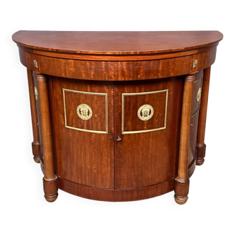 Empire style sideboard. Mahogany. Gilded bronze decoration.