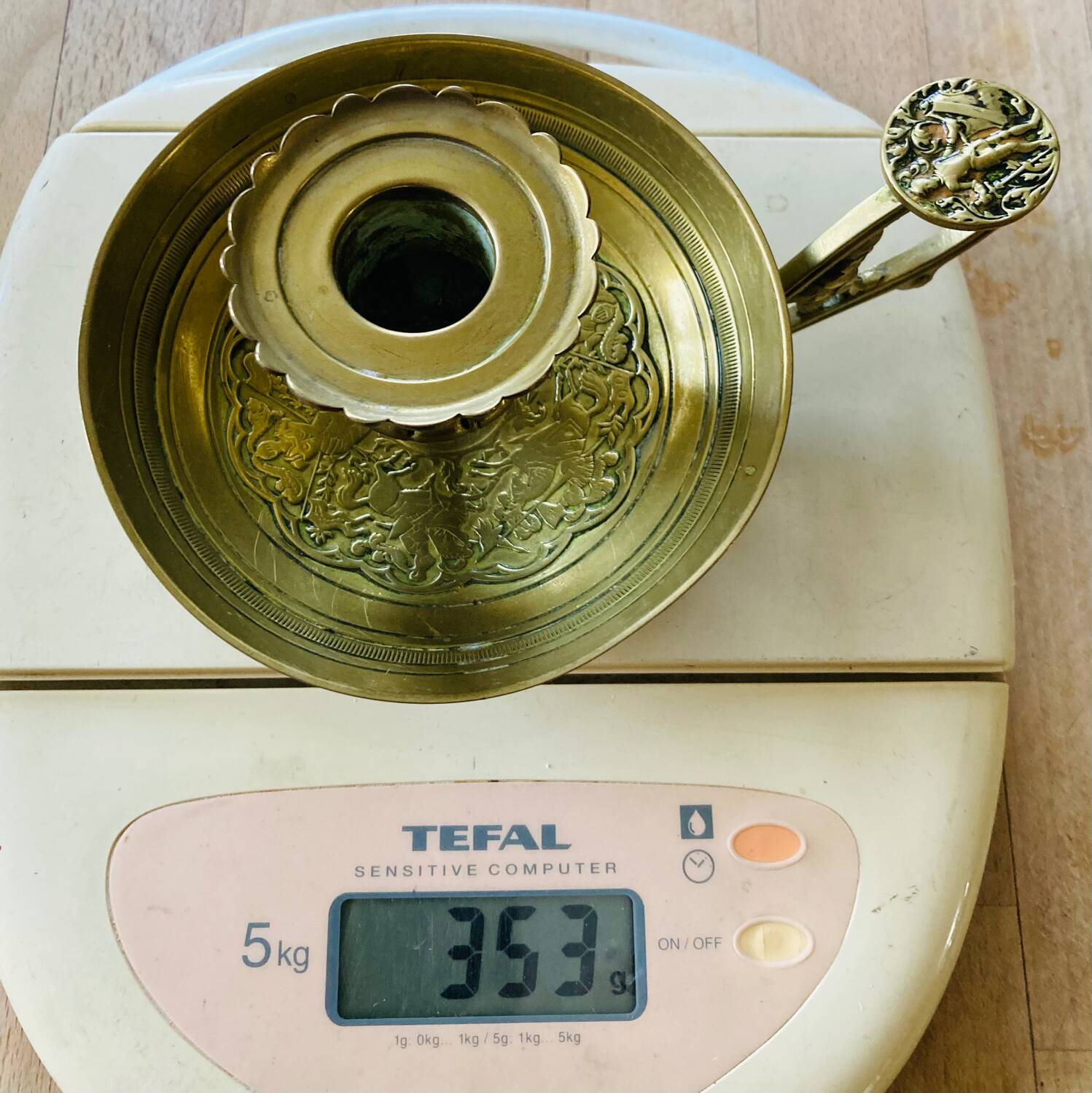 20th century chiseled brass socket candle holder representing Horsemen in armor