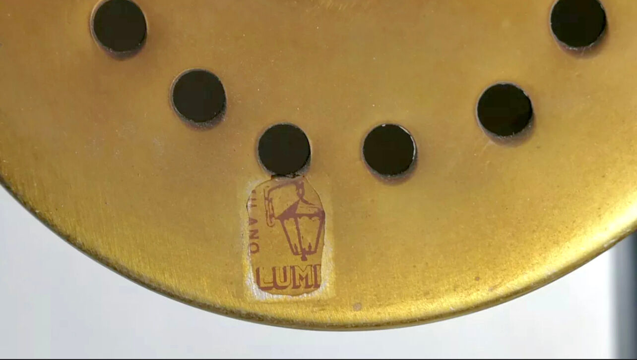 Mid-century modern pair of rare labeled Lumi Milano table lamps