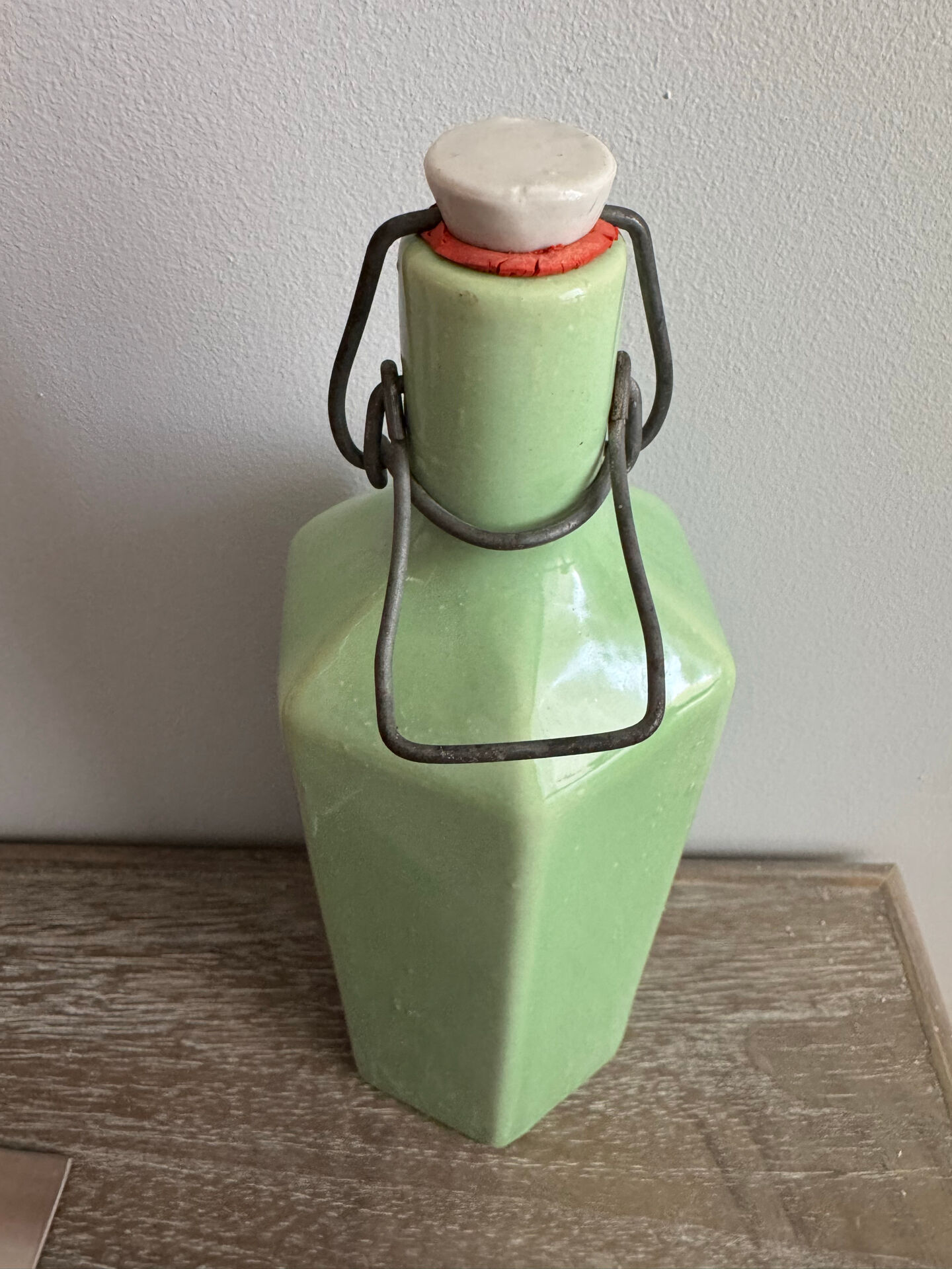 Véritable ancienne bouillotte six faces année 50