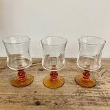 6 small amber stemmed glasses