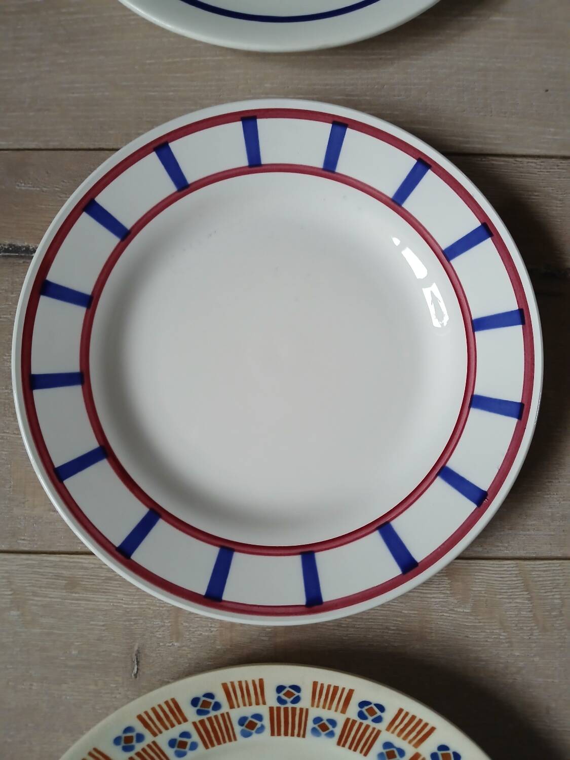 12 mismatched antique dinner plates