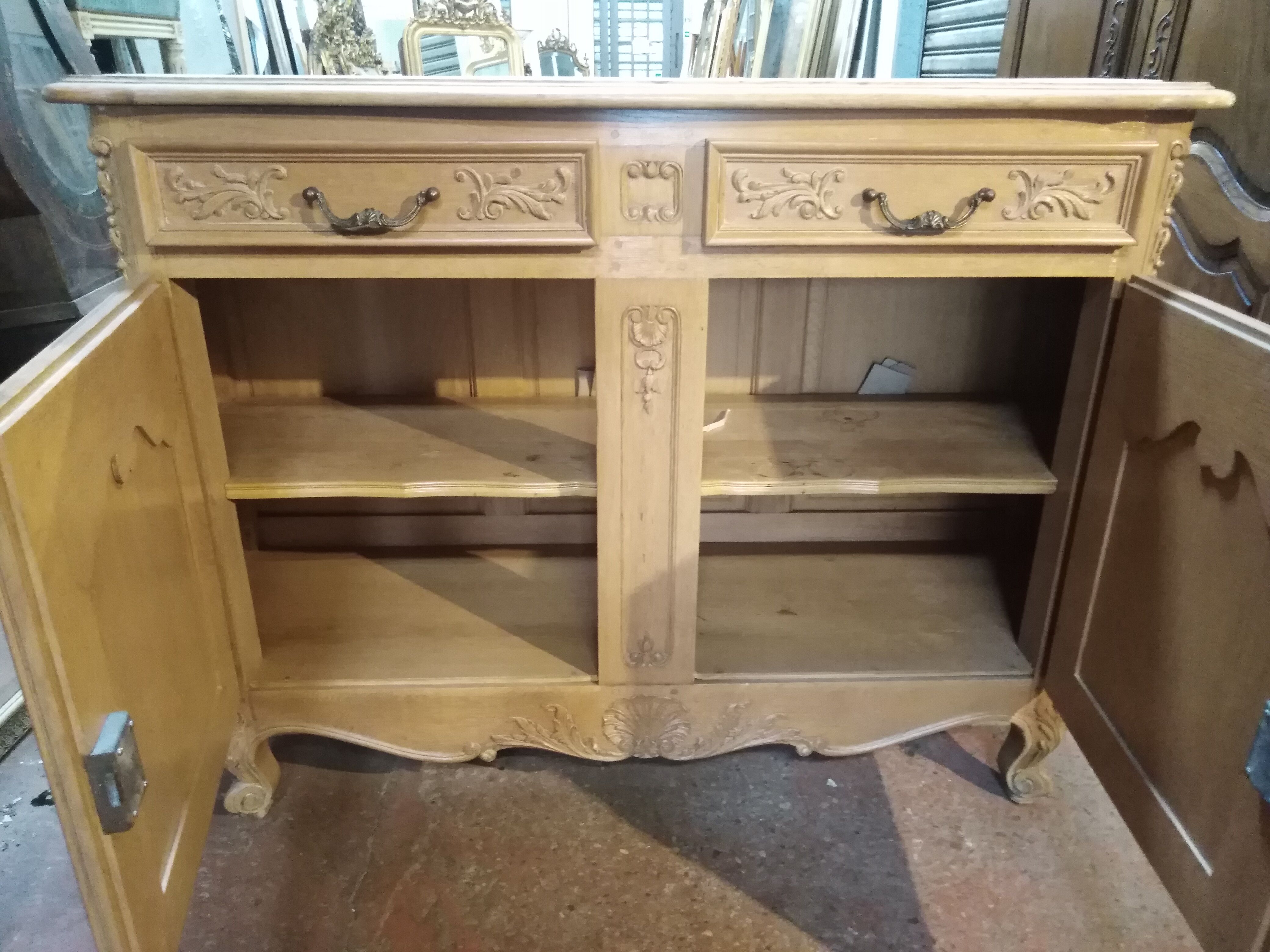 Curved buffet, sculpted Provençal style
