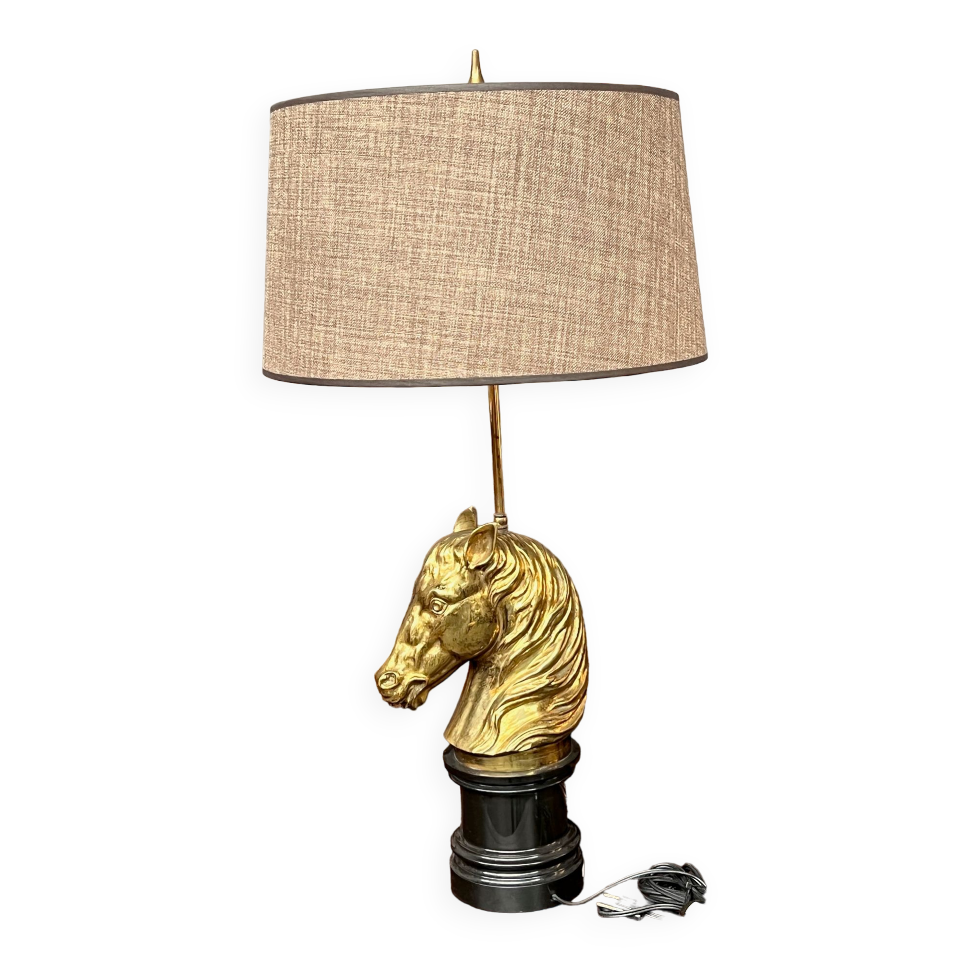 Table lamp made of solid bronze on a marble base.