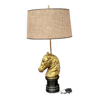 Table lamp made of solid bronze on a marble base.