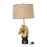 Table lamp made of solid bronze on a marble base.