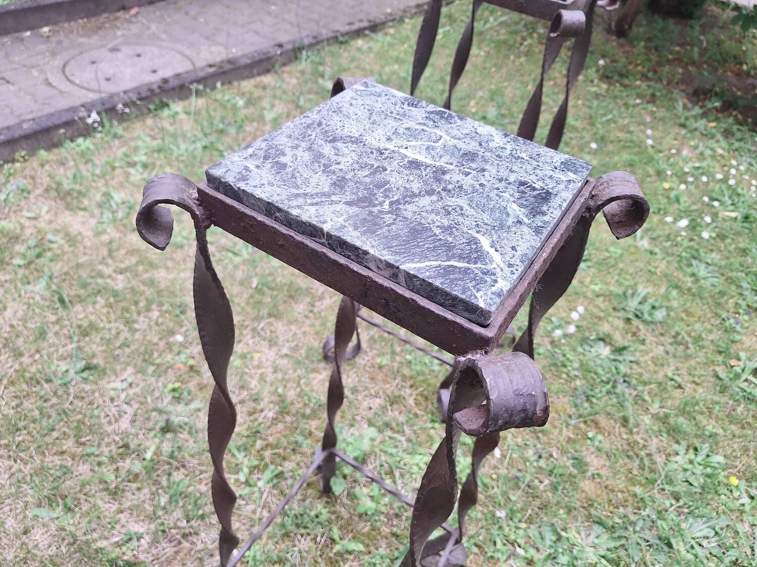 Pair of Brutalist patinated iron and veined marble columns, 1960s