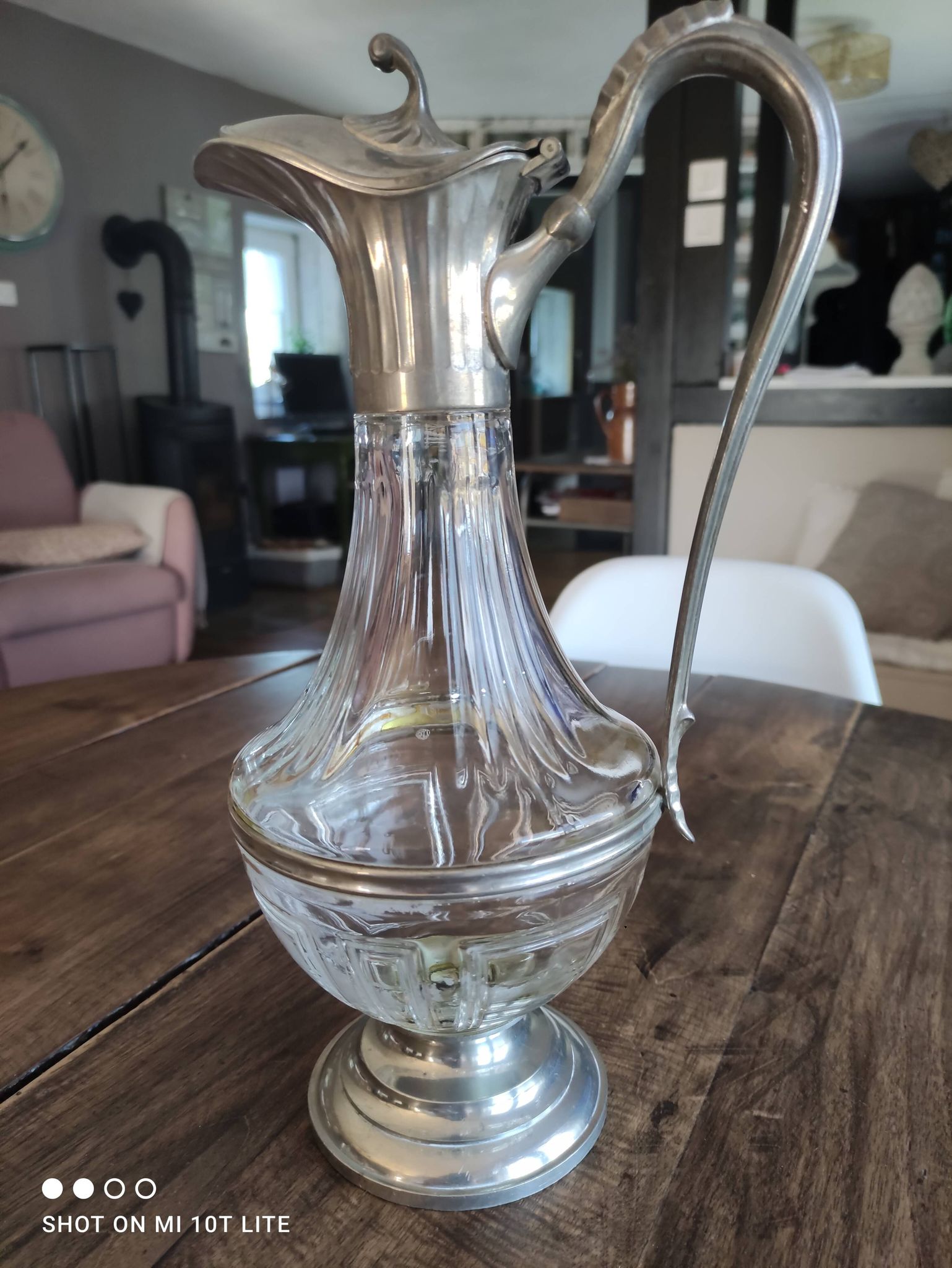 Old water decanter in curved glass and tin Art Nouveau style