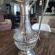 Old water decanter in curved glass and tin Art Nouveau style