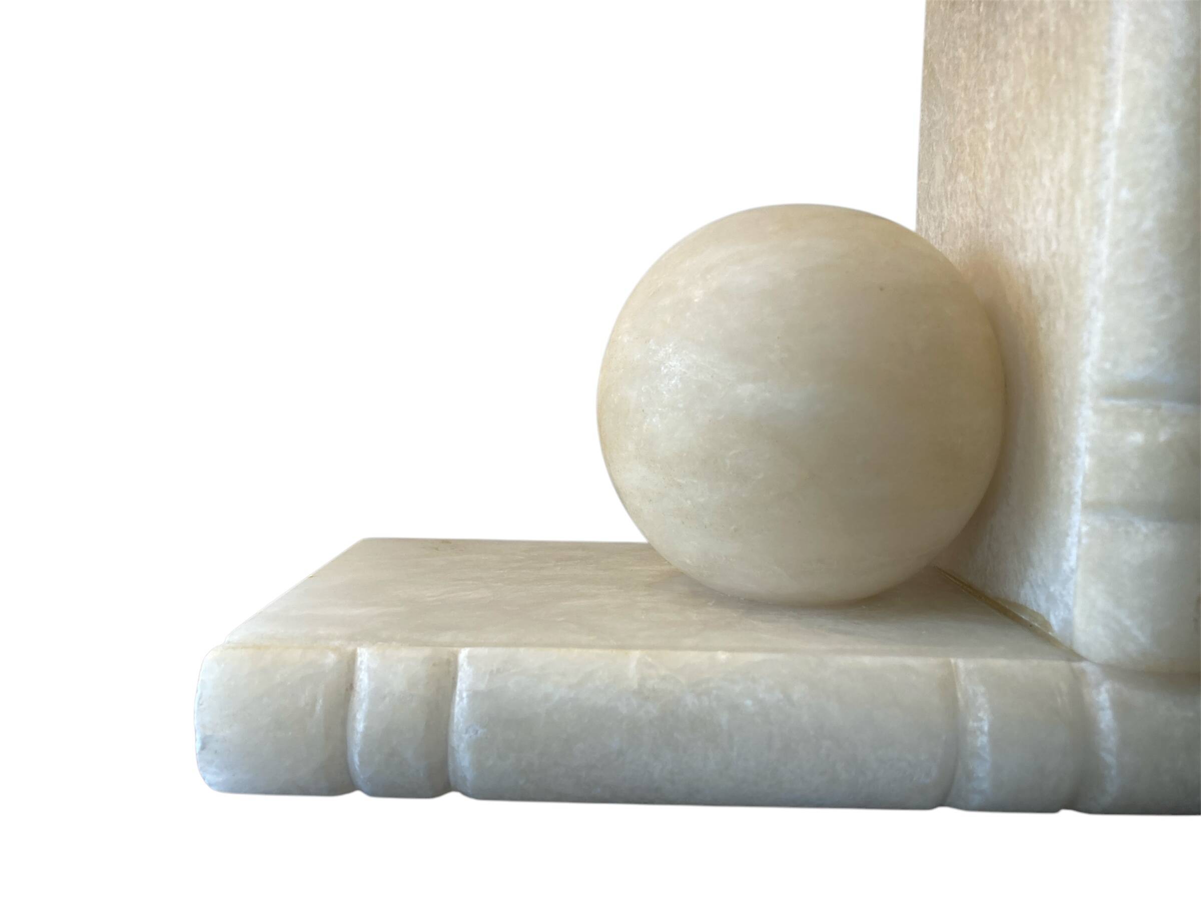 Paire de serres livres, Albâtre, Période Années 1930