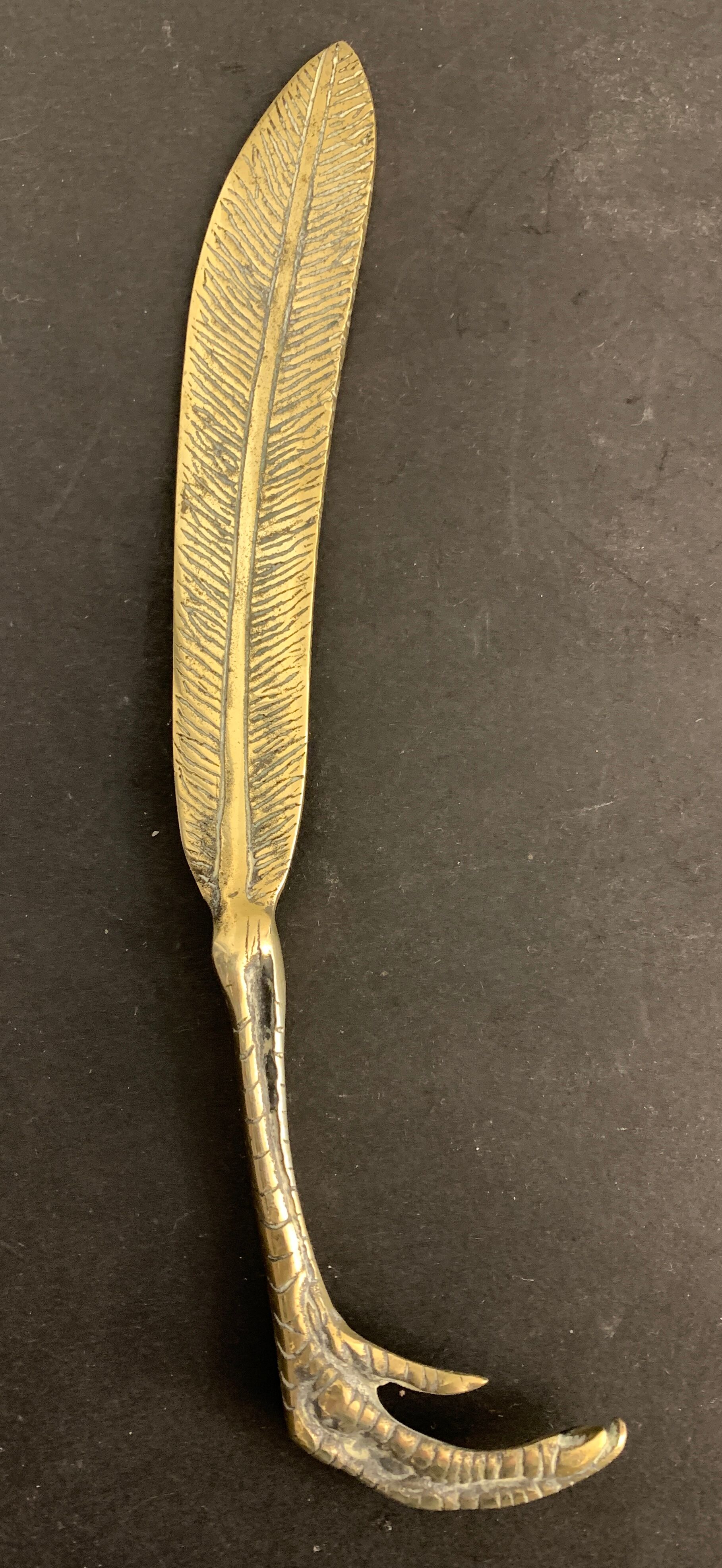 Paper cup or old bronze letter opener, eagle claw shape