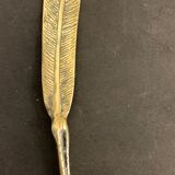 Paper cup or old bronze letter opener, eagle claw shape