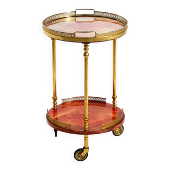 Round, small 1960s Aldo Tura serving or bar trolley in red goatskin leather