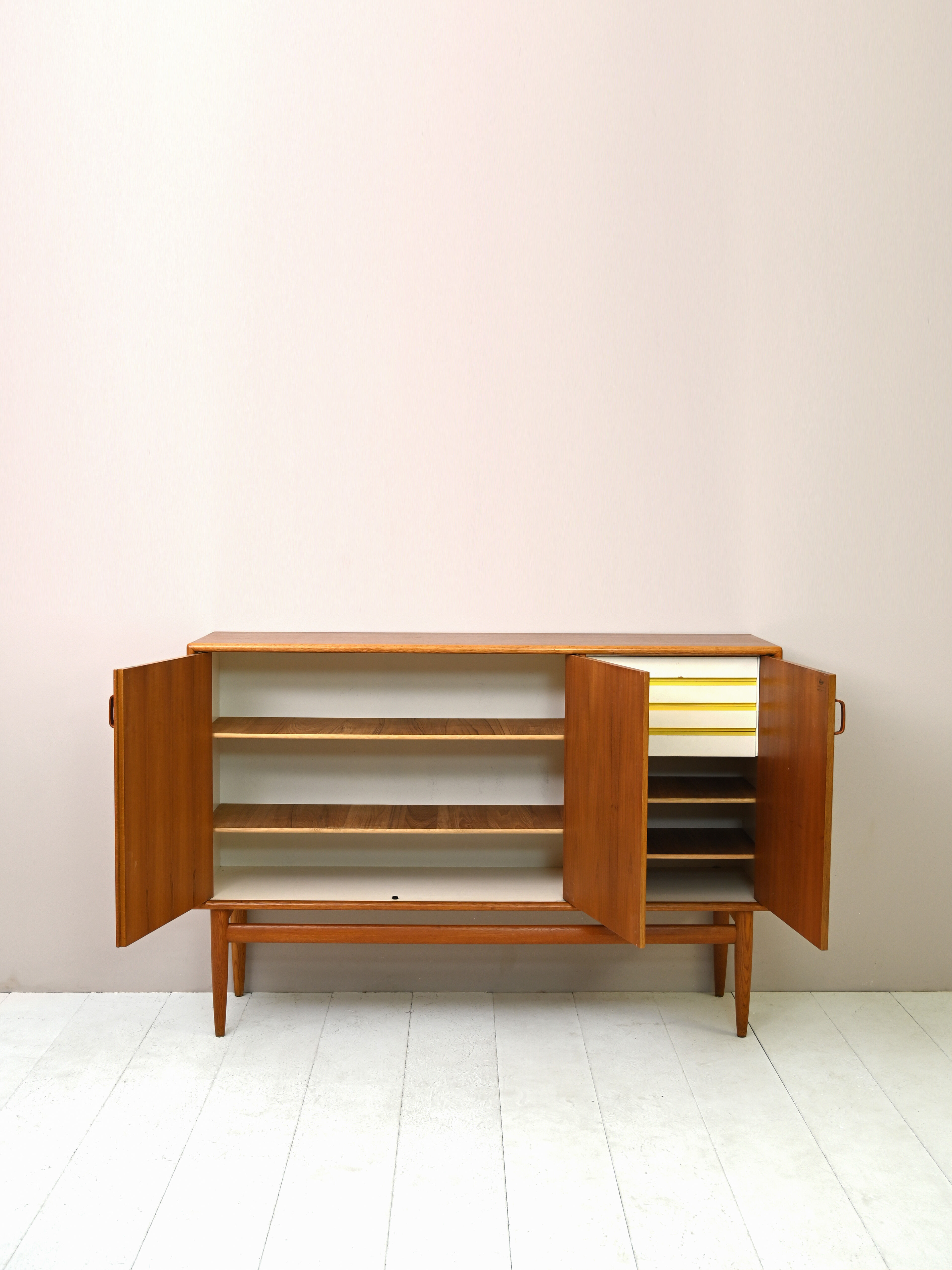 Scandinavian teak highboard with drawers