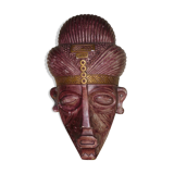 African mask in earth