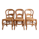 Set of 6 traditional wooden chairs with woven straw.