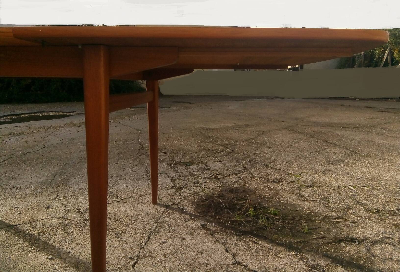 Danish Scandinavian teak dining table with extensions