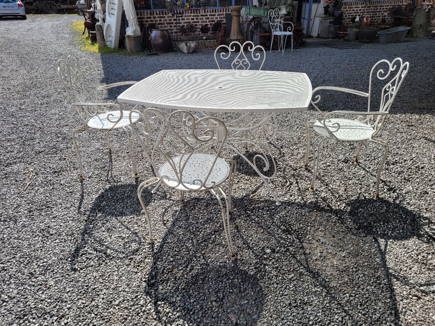 Old wrought iron garden furniture, table + 2 armchairs + 2 chairs