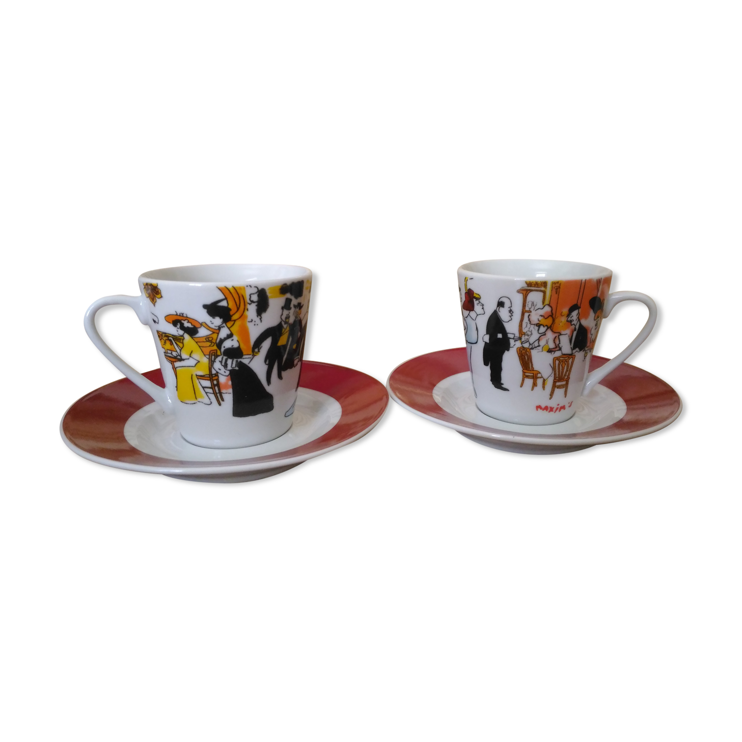 2 coffee cups with 2 porcelain saucers maxim's de paris
