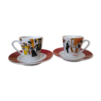 2 coffee cups with 2 porcelain saucers maxim's de paris