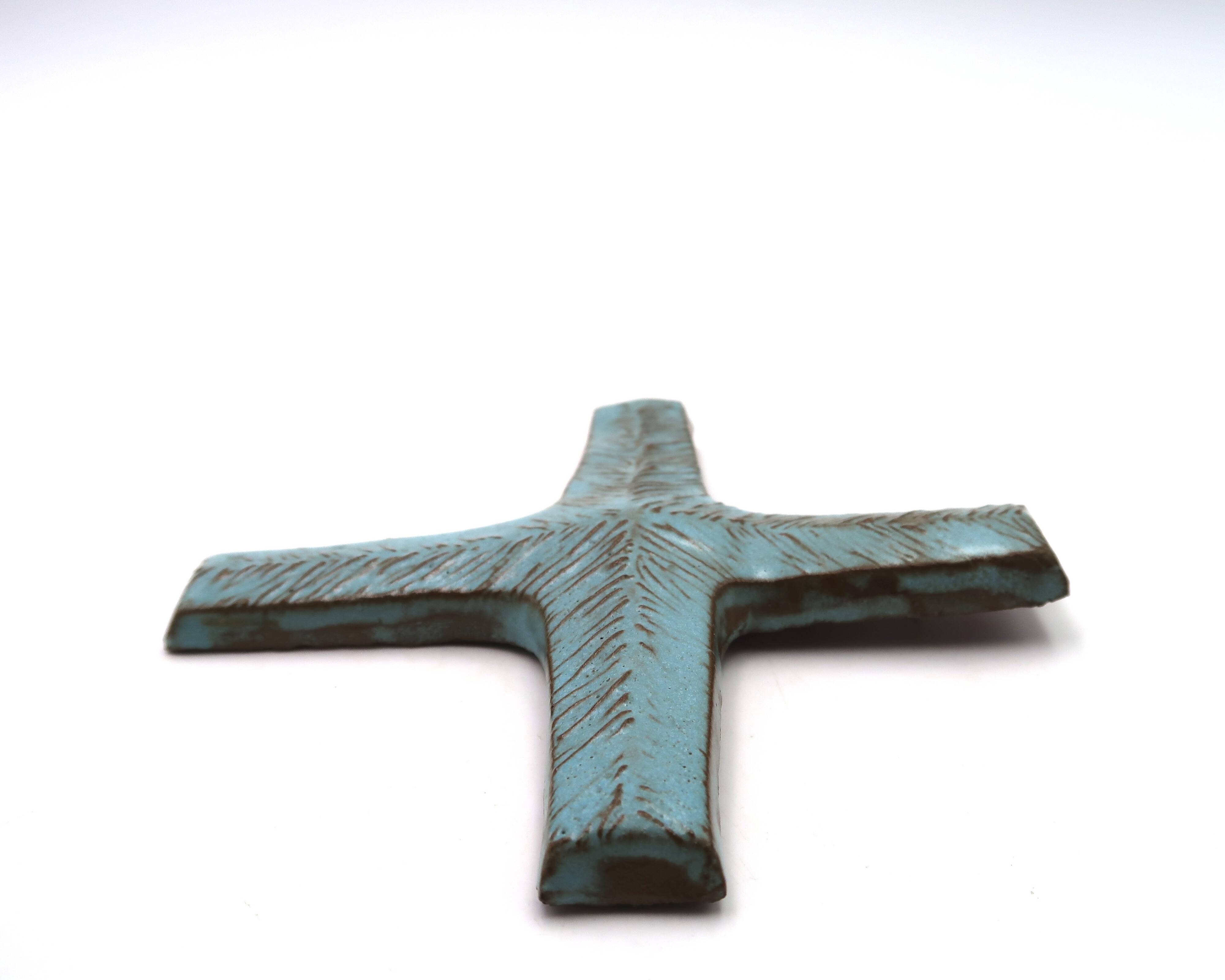 Pale blue ceramic wall cross signed Amphora, 1970s.