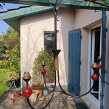 pair of vintage black metal chandeliers with red balls 1950/1970