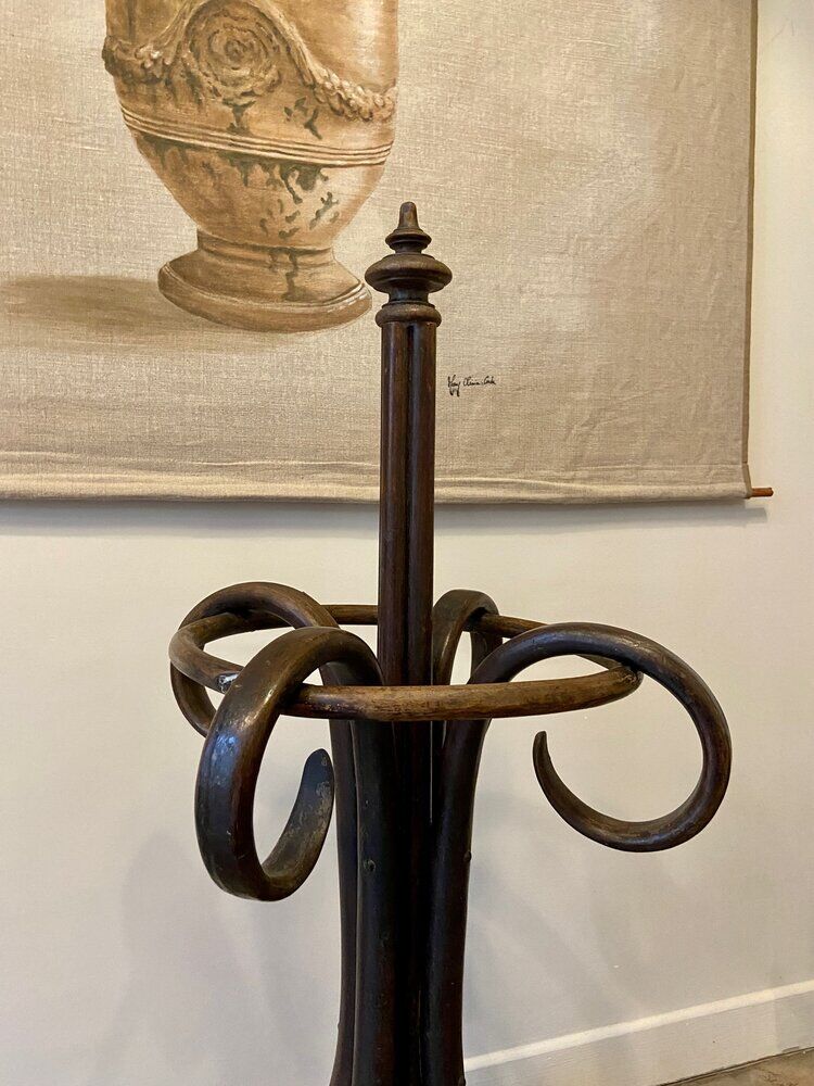 Umbrella holder in arched and dark wood