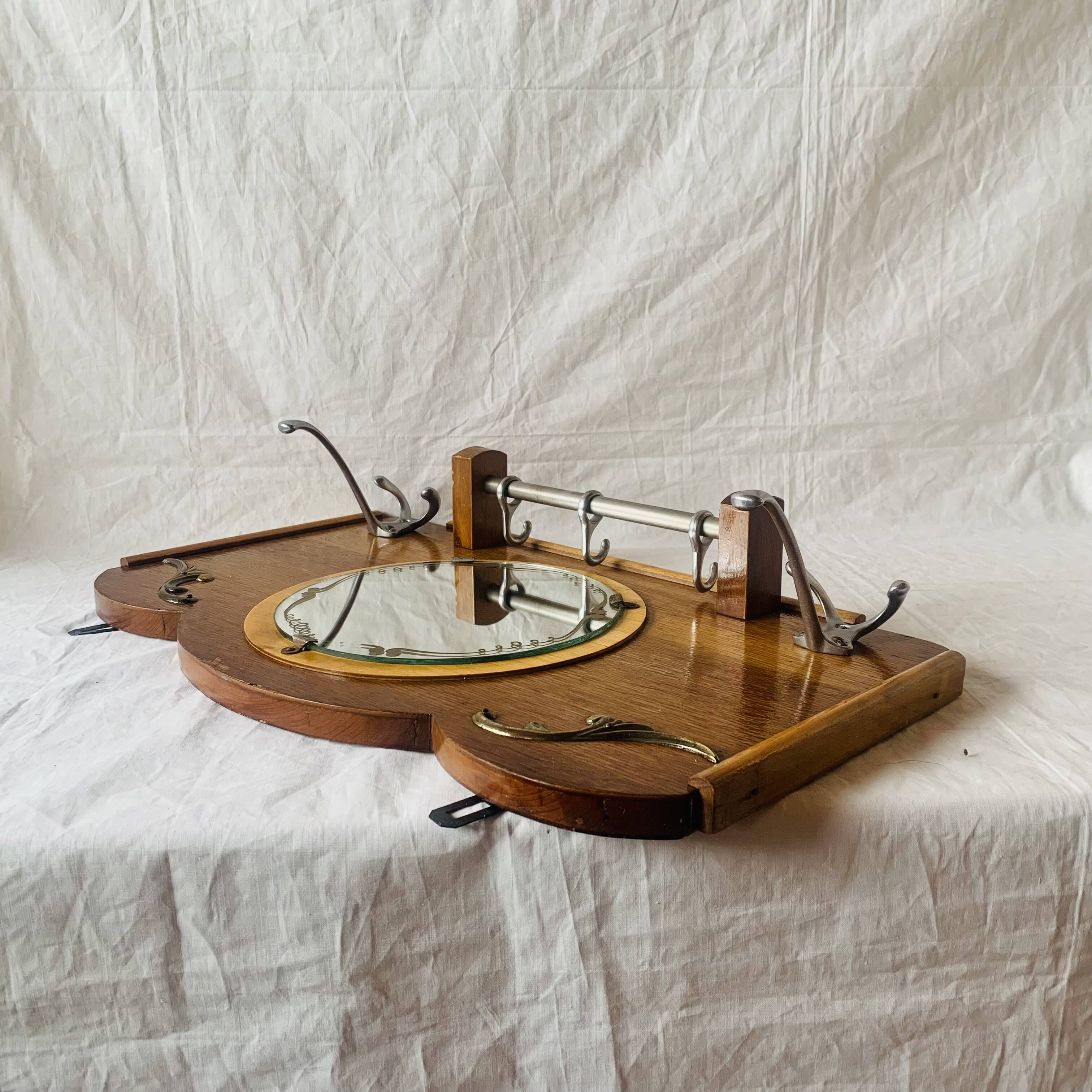 Art Deco wooden wall coat rack with round central mirror