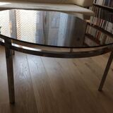Round coffee table in chrome metal and smoked glass