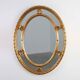 20th century neo-classical style tilted oval mirror by Deknudt, Belgium