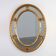 20th century neo-classical style tilted oval mirror by Deknudt, Belgium