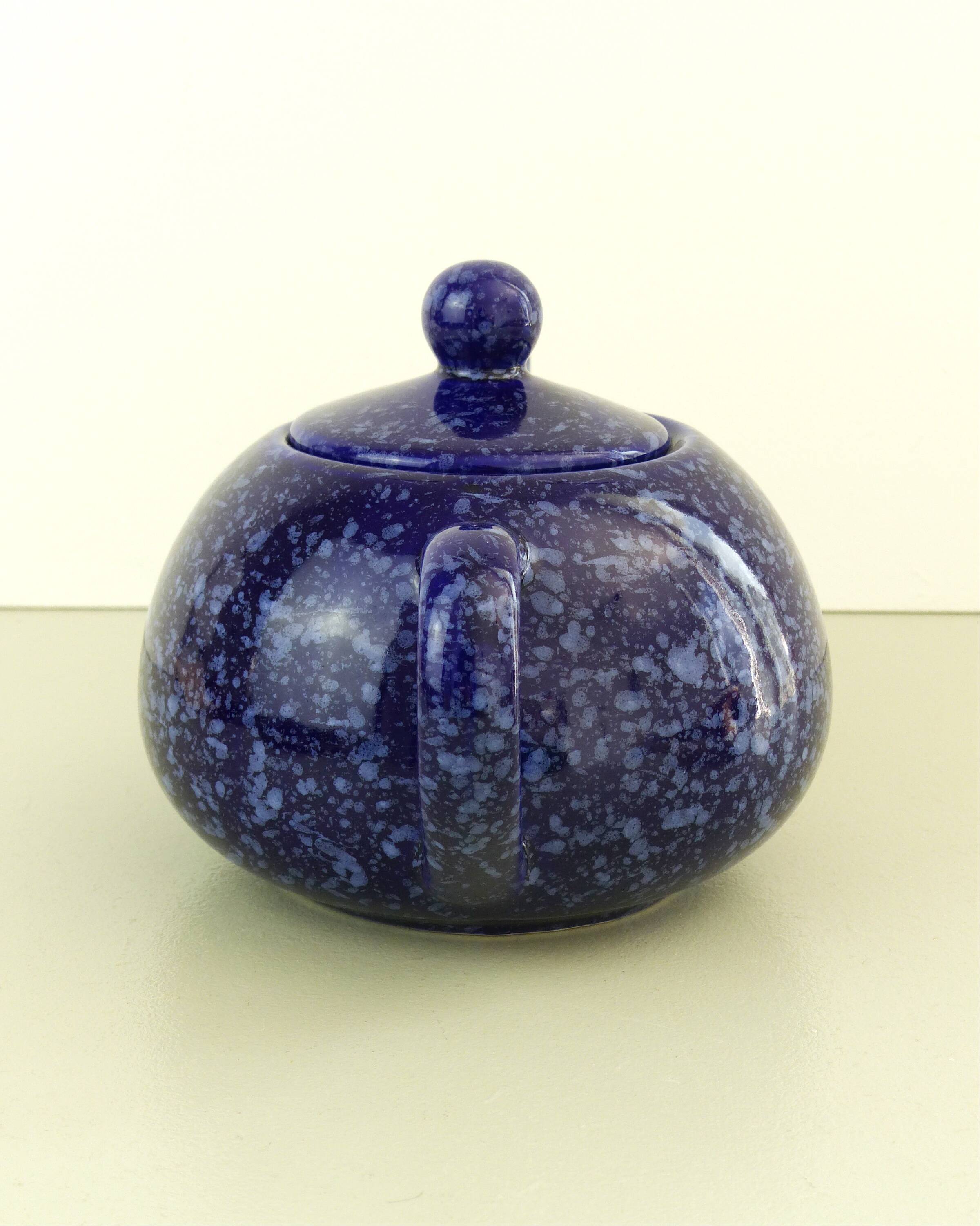 Blue glazed and speckled ceramic teapot
