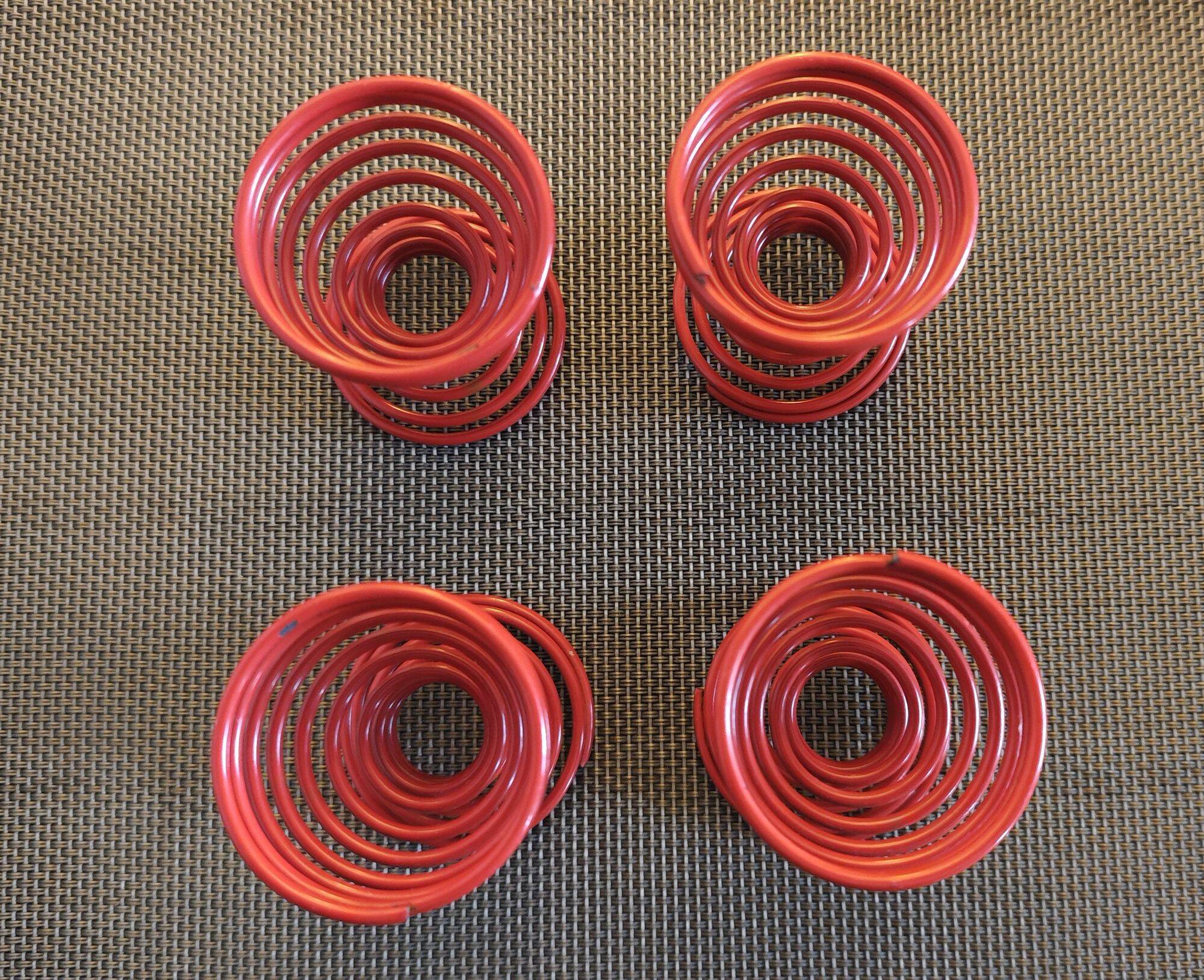 Set of 4 red lacquered spring egg cups - 1980s