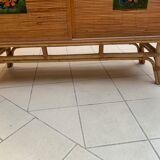 Rattan sideboard with ceramics