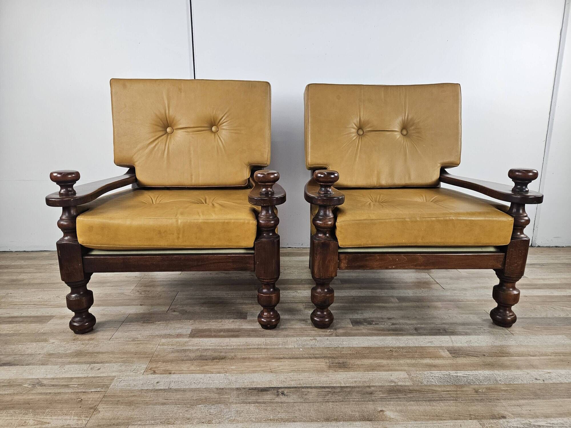 1980s leather and solid wood armchairs
