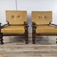 1980s leather and solid wood armchairs