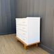 Compass leg chest of drawers