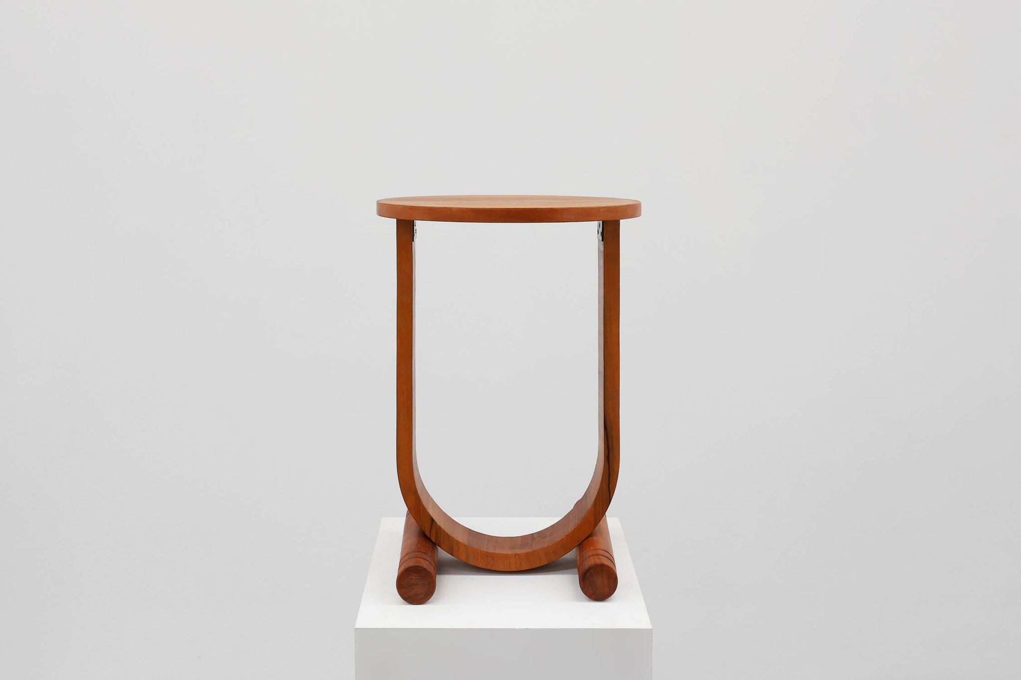 Art deco oak wooden round side table with bended leg, France 1920s