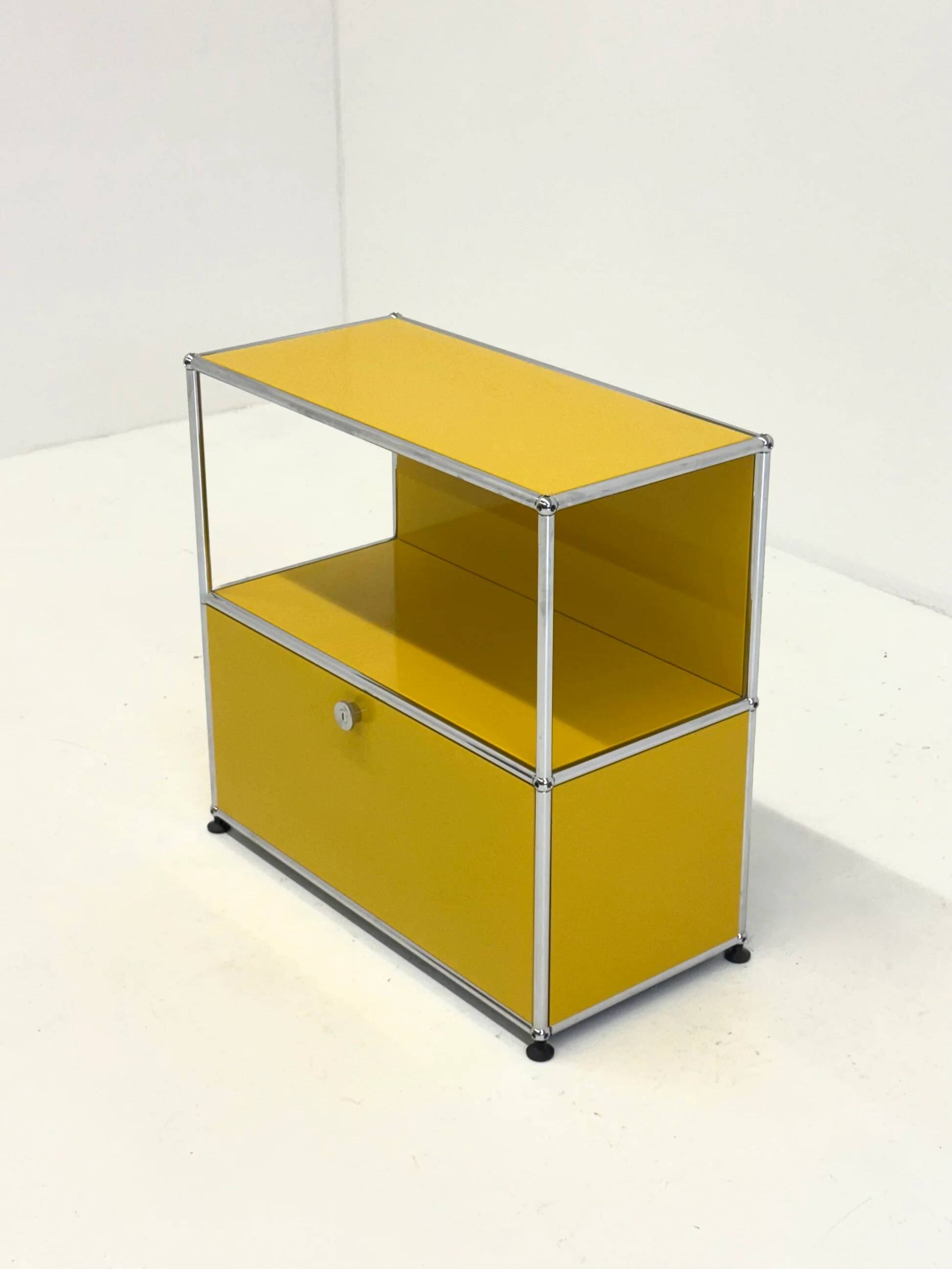 USM Haller cabinet in yellow