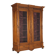 Antique walnut wardrobe with glass and carvings, Italy, 19th century.