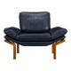 Danish teak and navy blue leather lounge chair from Komfort, 1970s