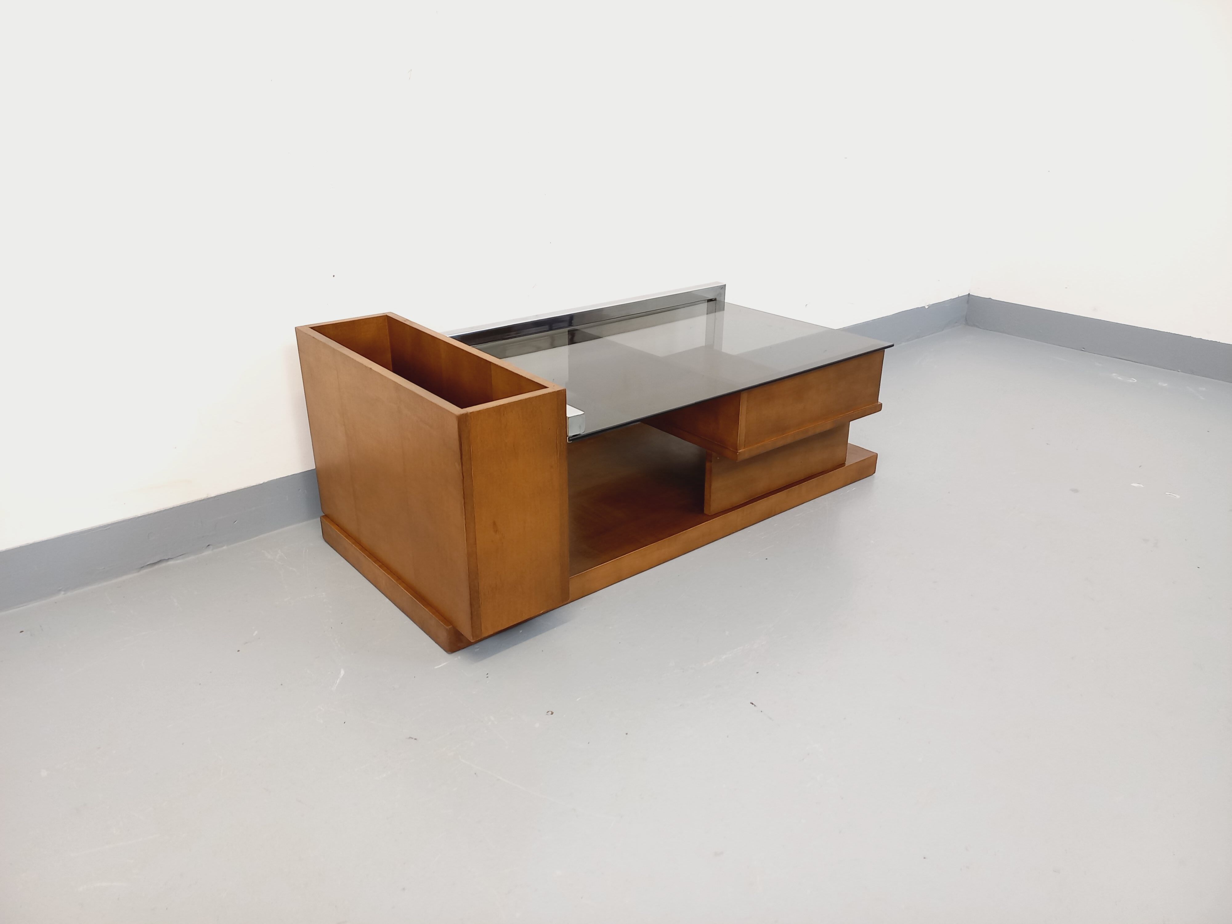 Rectangular vintage modernist coffee table with wooden niches, chrome.