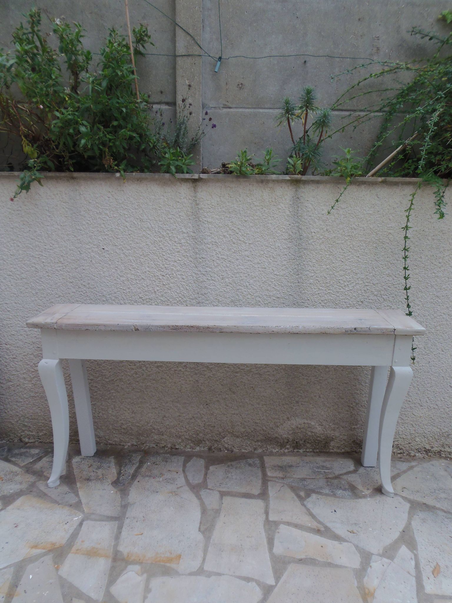 Console with a cotton grey patinated base, top in bleached walnut.