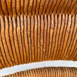 Vintage armchair in straw and brutalist wood