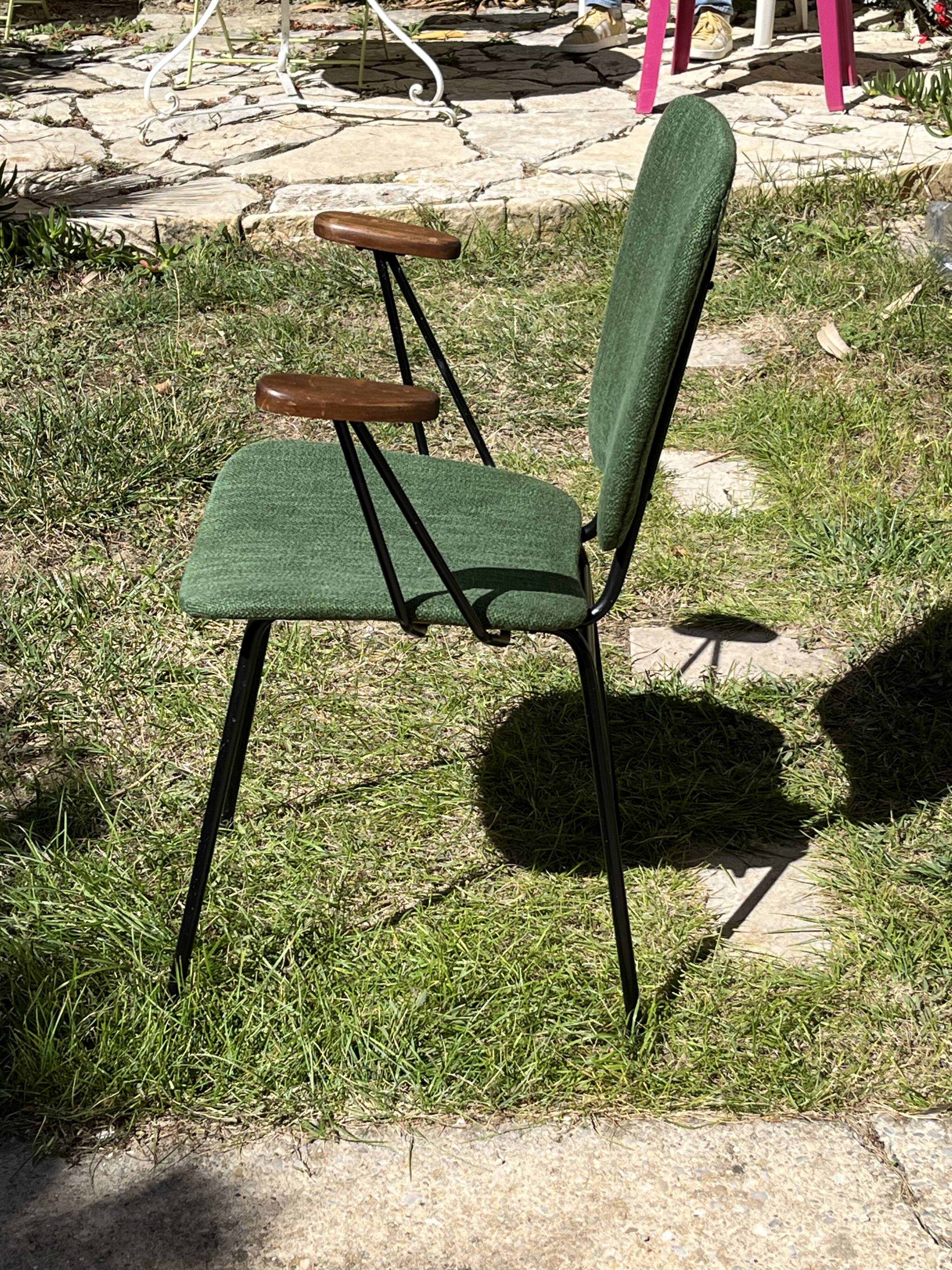 50s chair with armrests.