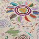 White suzani kilim rug with embroidered multi-colored patterns
