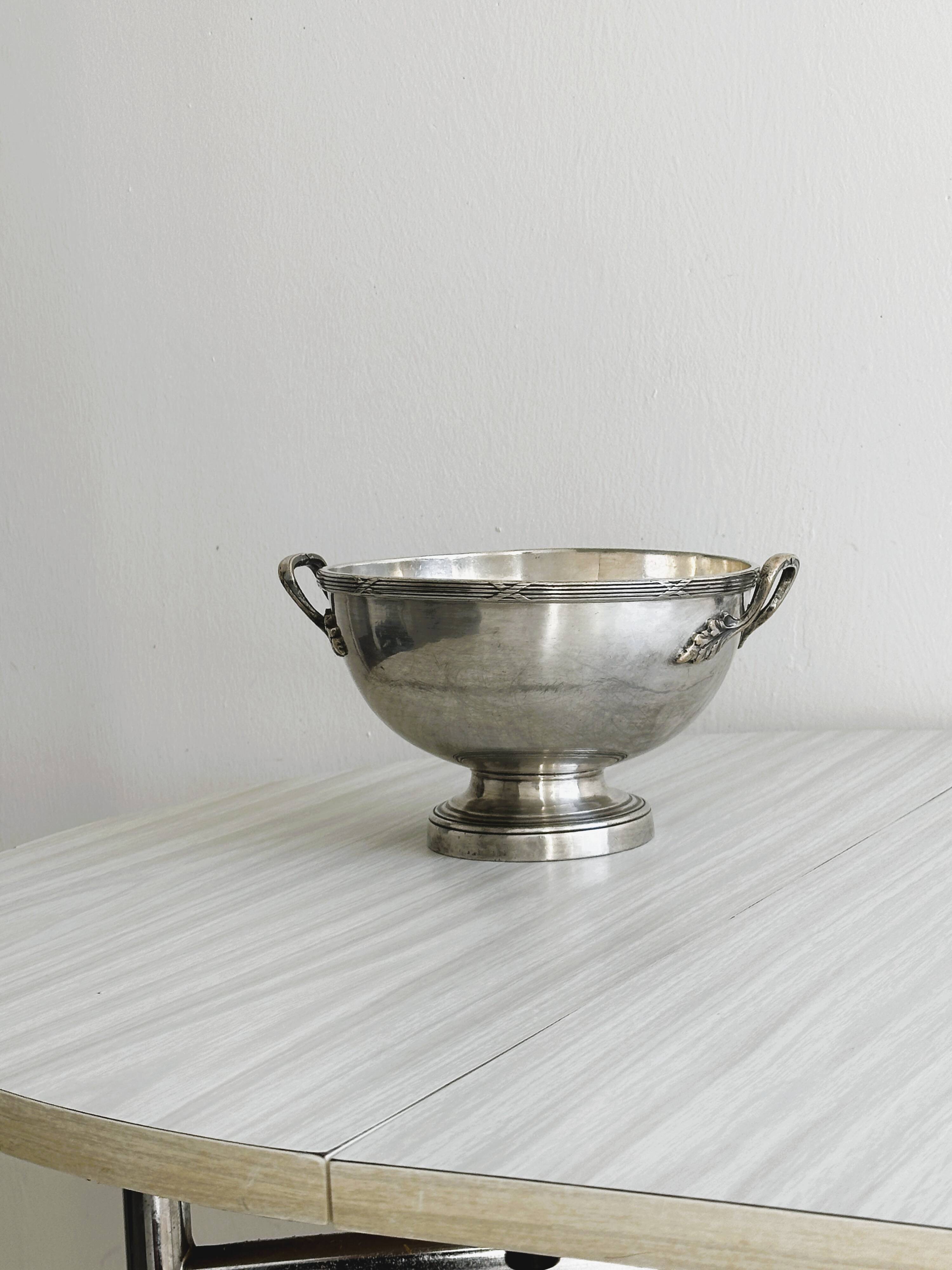 Metal salad bowl on foot